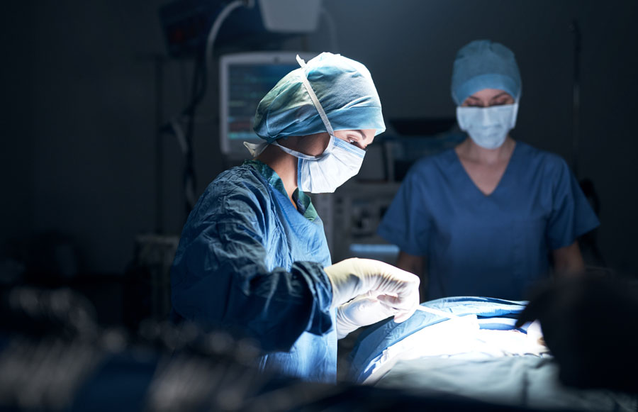 Surgeon operating on a patient