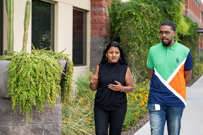 Aaron and Safiyyah during one of their regular “walk and talk” meetings.