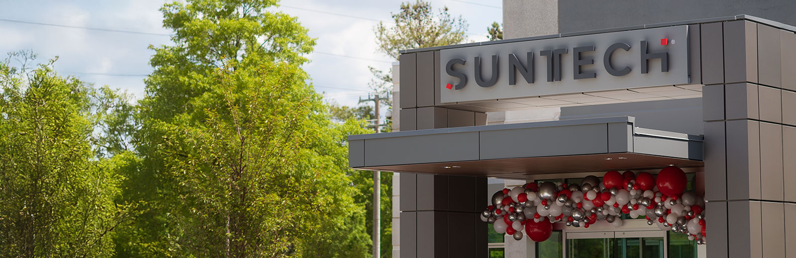 suntech-ribboncutting-banner