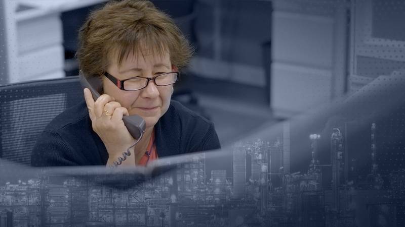 a woman talking over phone