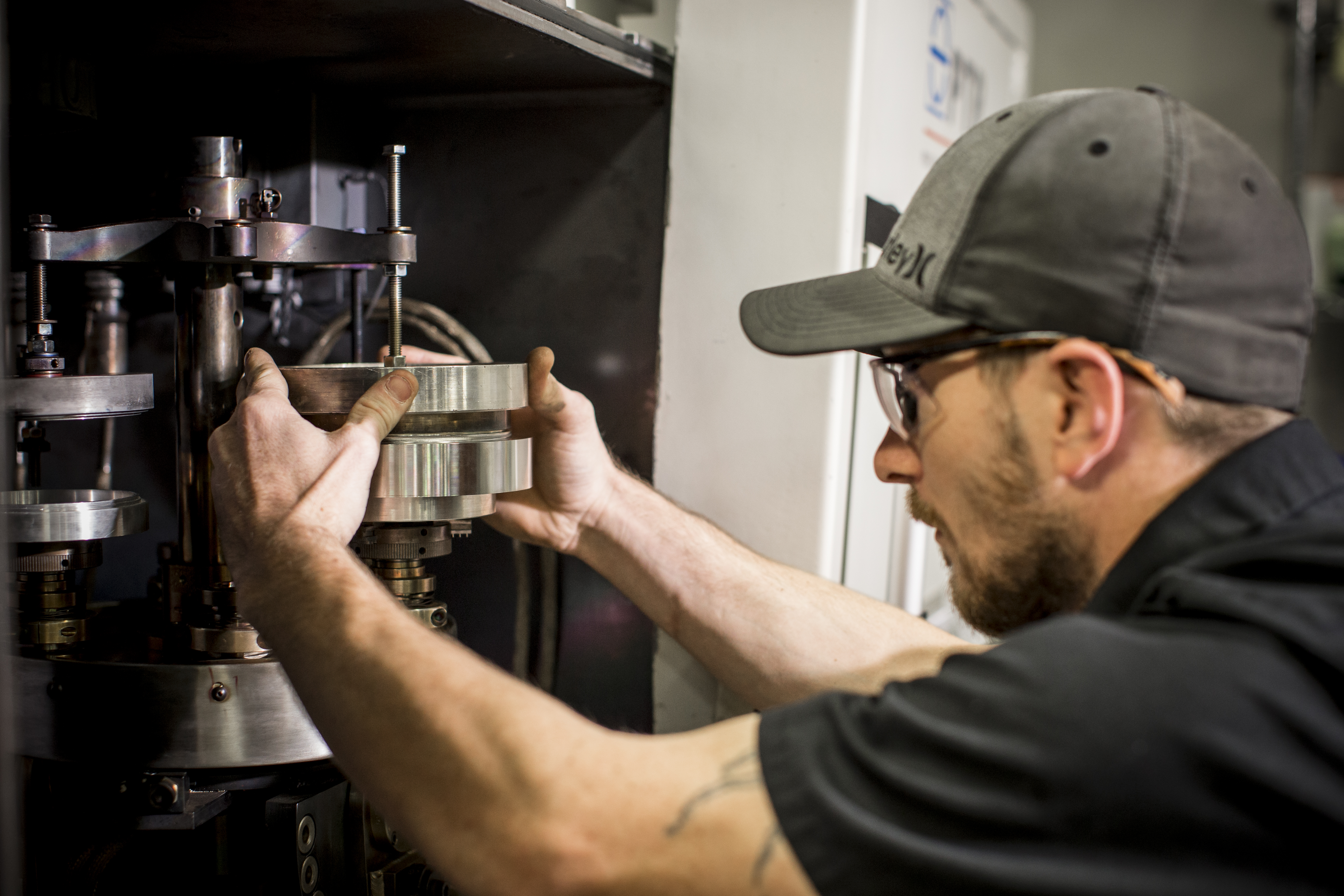 a man trying to solve issue in machine